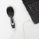USB четка за ресане на коса. Компанията Thanko е известна с множеството си нетрадиционни USB устройства. Например като тази четка за ресане на коса. Тя разполага с вграден резервоар за вода и нагревател. Така може да правите прическата си и пред лаптопа.