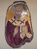 Икона изрисувана върху дървено корито, в което в миналото са месили хляб (нощви).