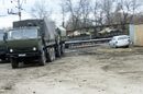 Транспортиране на руски танкове през западния руски град Весьолая Лопан, на границата с Украйна