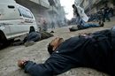 Тела лежат по улиците в бежанския лагер Джабалп в северната част на ивицата Газа на 6 март 2003 г.