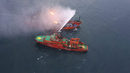 Снимка от хеликоптер показва спасителната акция в Керченския проток, където пожар обхвана два кораба по време на преливане на гориво. Официално беше съобщено за 12 оцелели и 10 загинали, но шансовете да бъде спасен някой от 10-те изчезнали е нищожен.