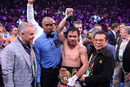 Легендарният боксьор Мани Пакиао се завърна на ринга и спечели световната титла в полусредна категория на Световната боксова асоциация (WBA). Филипинецът записа едва втори мач за последната година, но победи американеца Кийт Търман, с което му взе титлата.