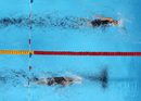 Момент от финалите на състезанието по плуване на 100 метра гръб за жени на Панамериканските игри в Лима, Перу.