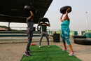Хора тренират в Абуджа, Нигерия.