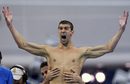 Американските плувци Майъл Фелпс и Гарет Уебър-Гейл се радват за току що спечеленото злато на 4x100 метра свободен стил на олимпиадата в Пекин (11 авг. 2008 г.)