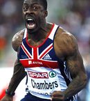 Дуейн Чембърс реагира, след като е пресякъл първи финалната линия на 60 м на европейското първенство по лека атлетика в зала в Торино<br />