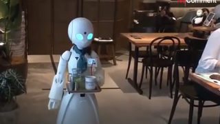 Кафене в Япония нае хора с увреждания, за да управляват роботи сервитьори