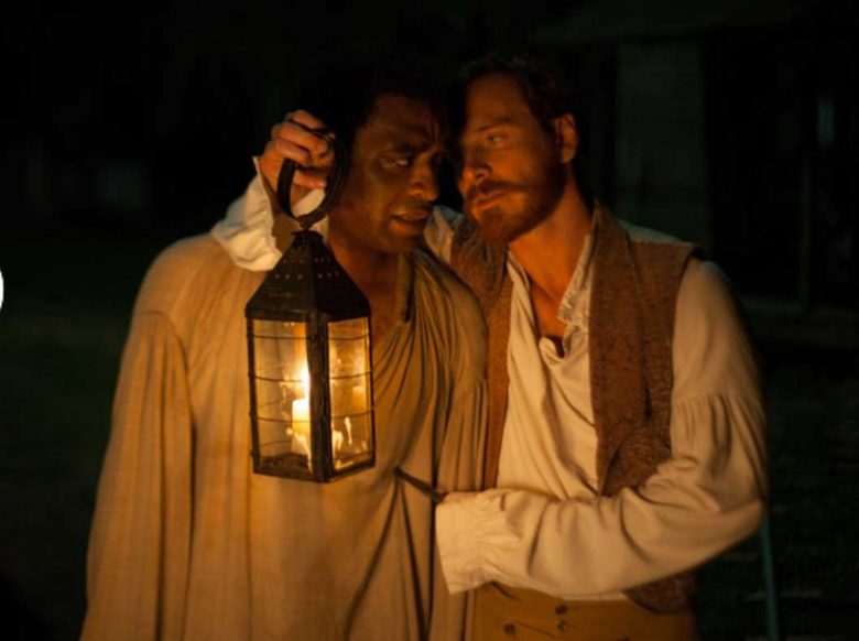 Чиyетел Еджиофор и Майкъл Фасбендър като неговия хладнокръвен господар в 12 Years a Slave
