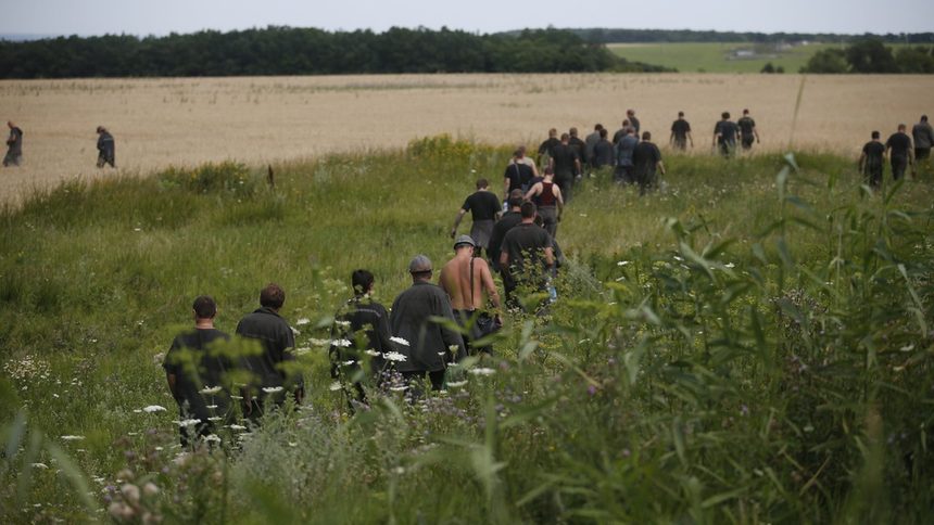 Украинските миньори помагаха за издирване на тленни останки от падналия малайзийски боинг.