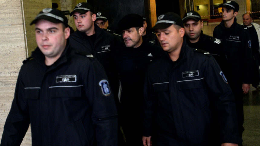 Банев с полицейска охрана в Съдебната палата в София преди две години.